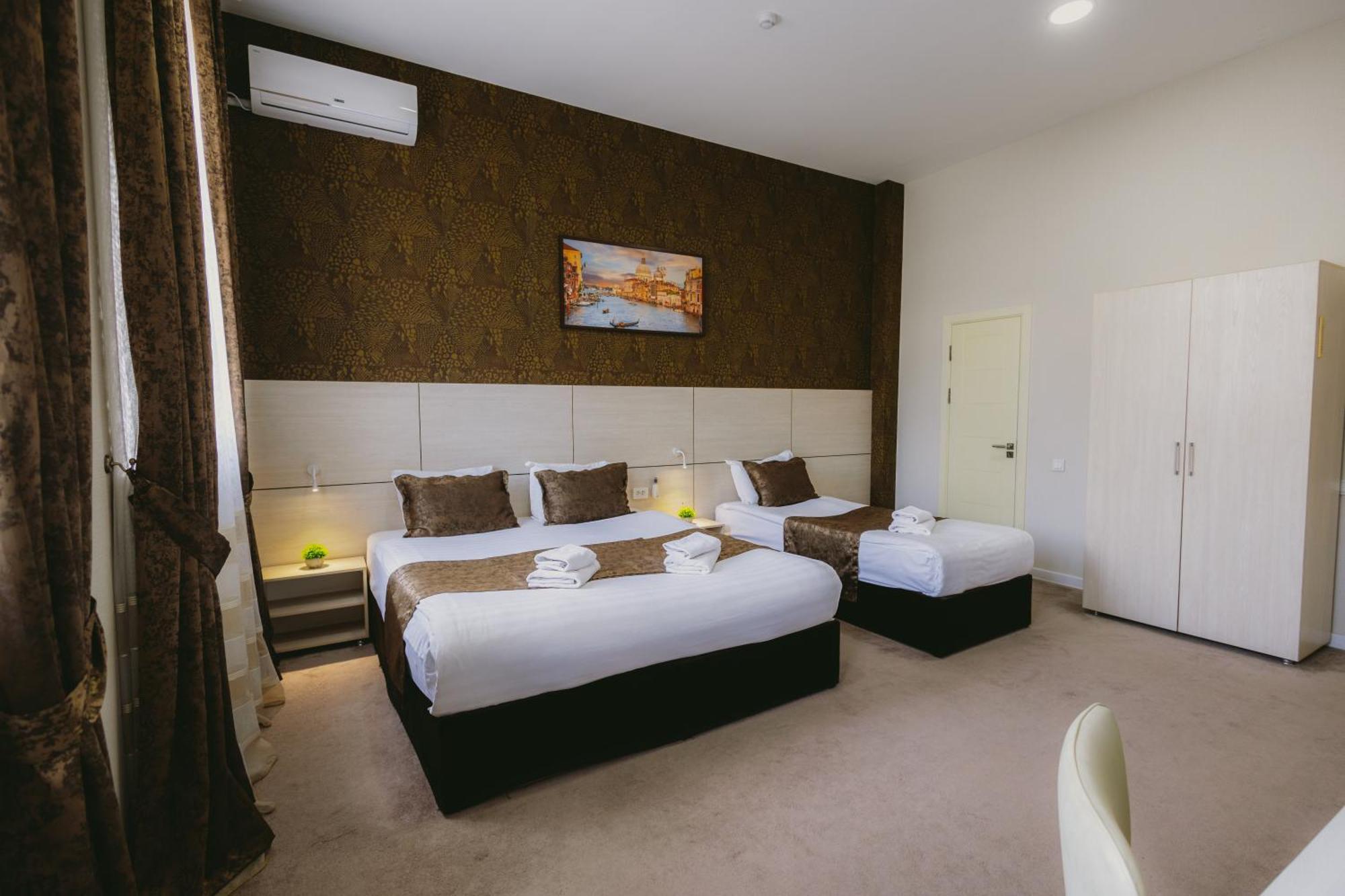 City Hotel Tachkent Extérieur photo